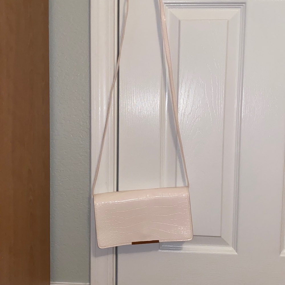 White snakeskin purse